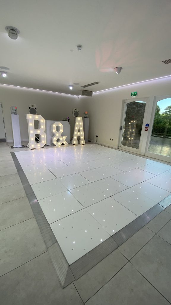 White starlit dance floor at Arley House