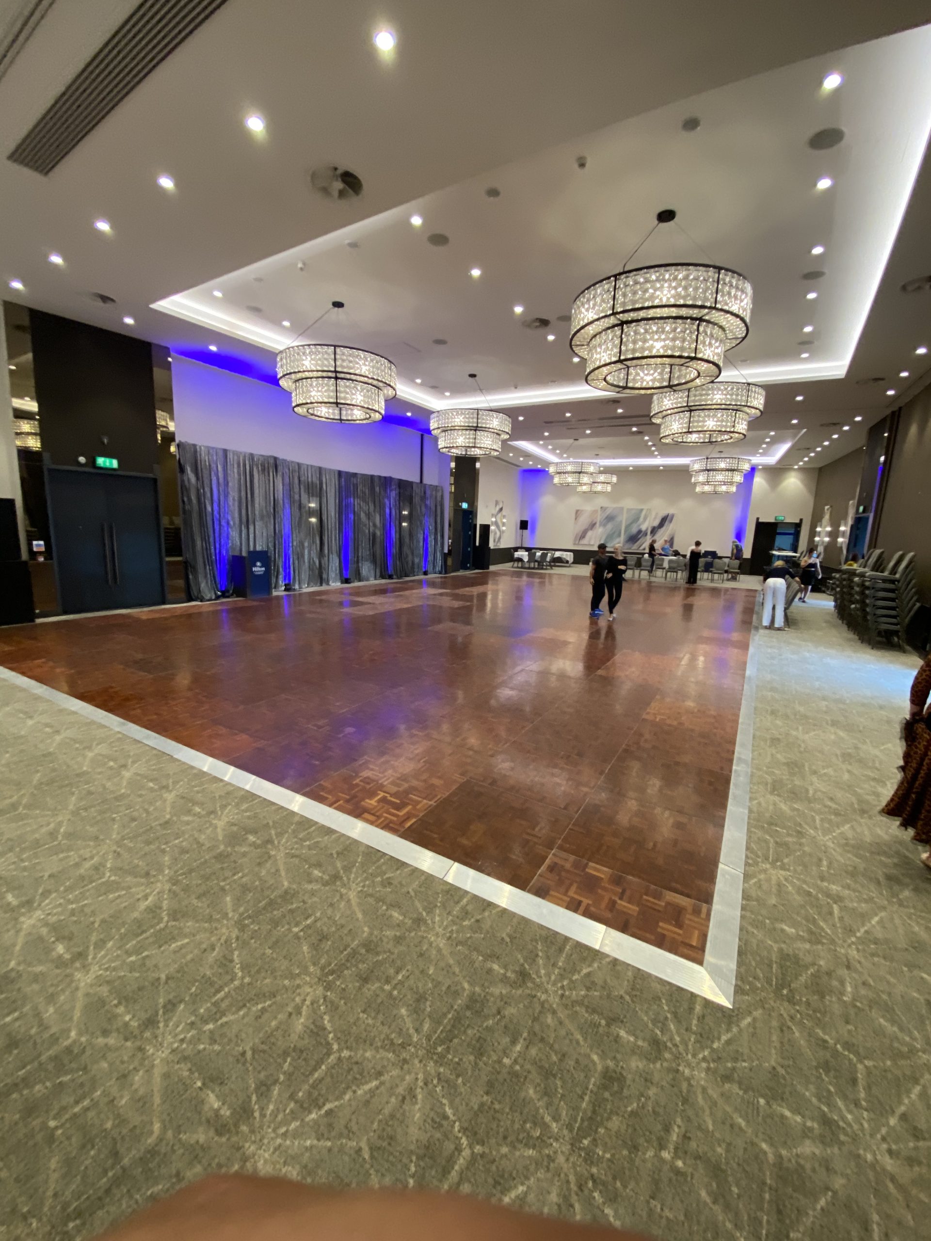 A 30' x 54' parquet dance floor installed in a function room in Southampton