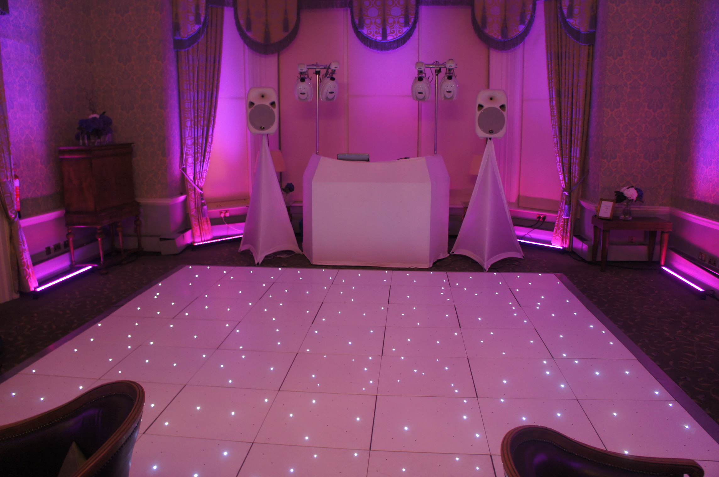 white led dance floor with DJ setup