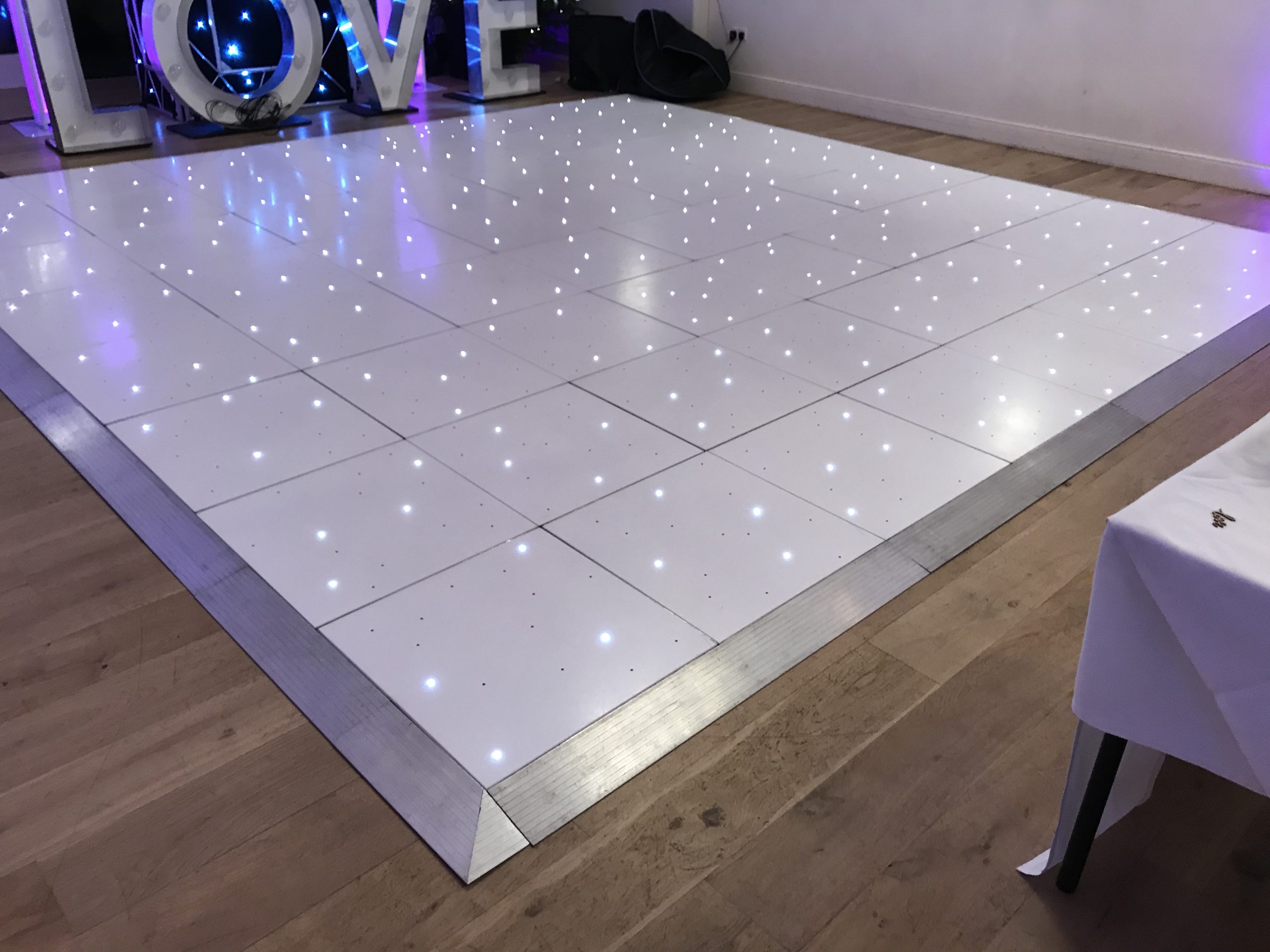 White starlit dance floor at Hyde Barn