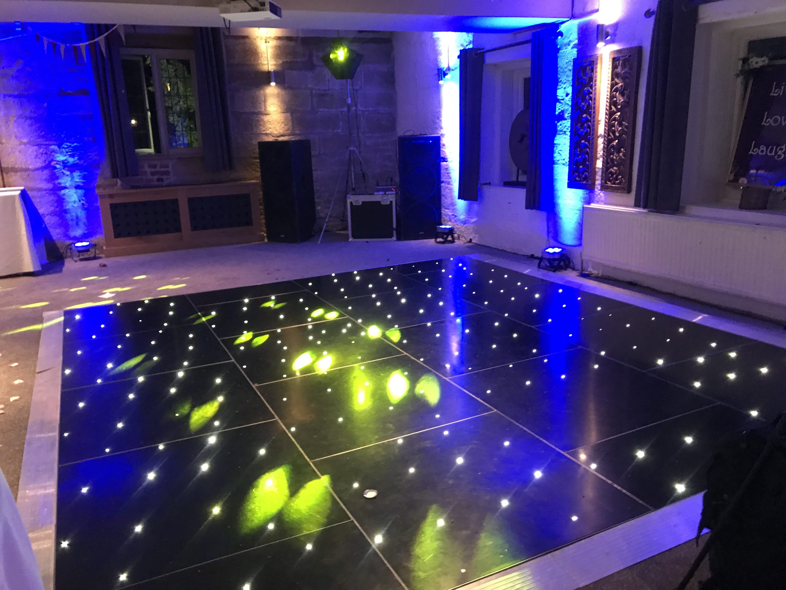 Small black starlit twinkle dance floor at the Saxon Mill