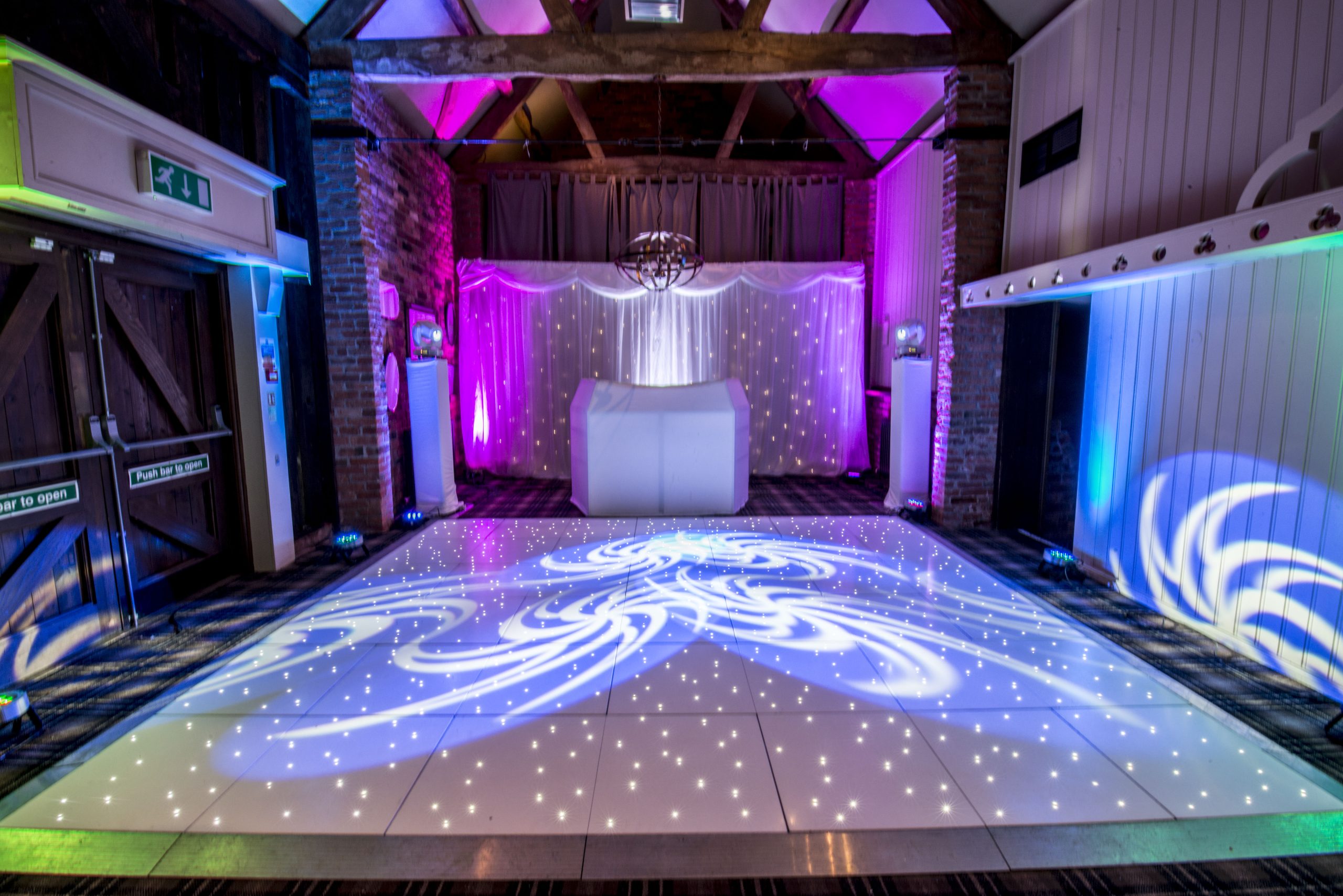 White twinkle dance floor measuring 14' x 14'