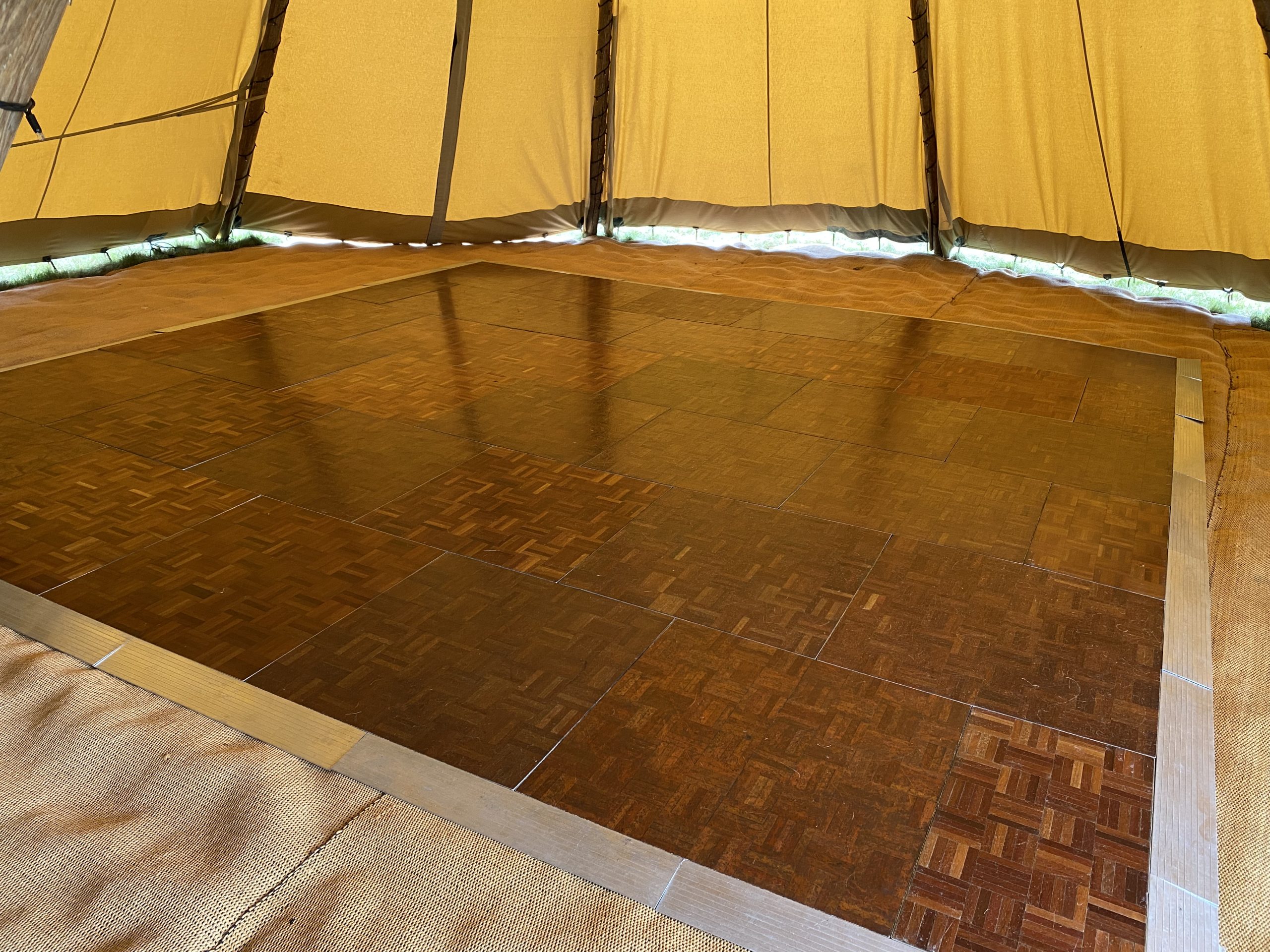 Wooden dance floor in a tipi