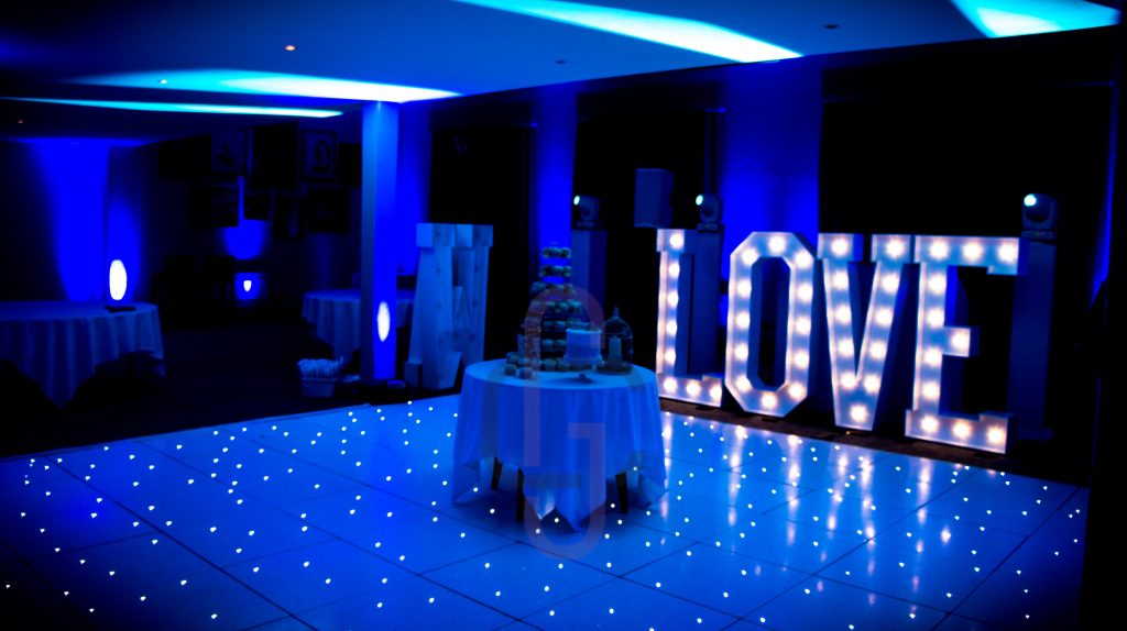 White starlit dance floor in the Courtyard at Walton Hall