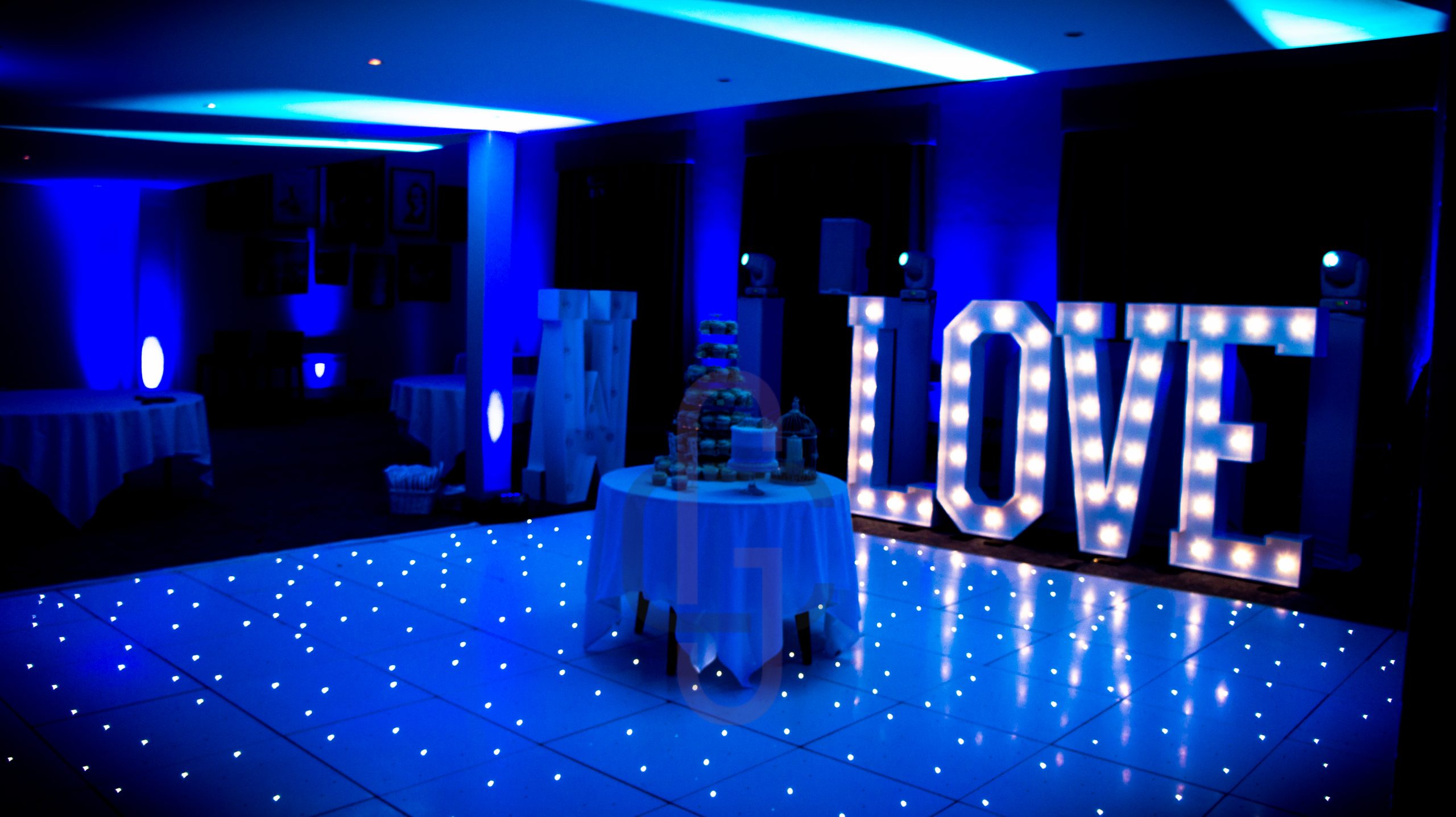 White starlit dance floor in the Courtyard at Walton Hall