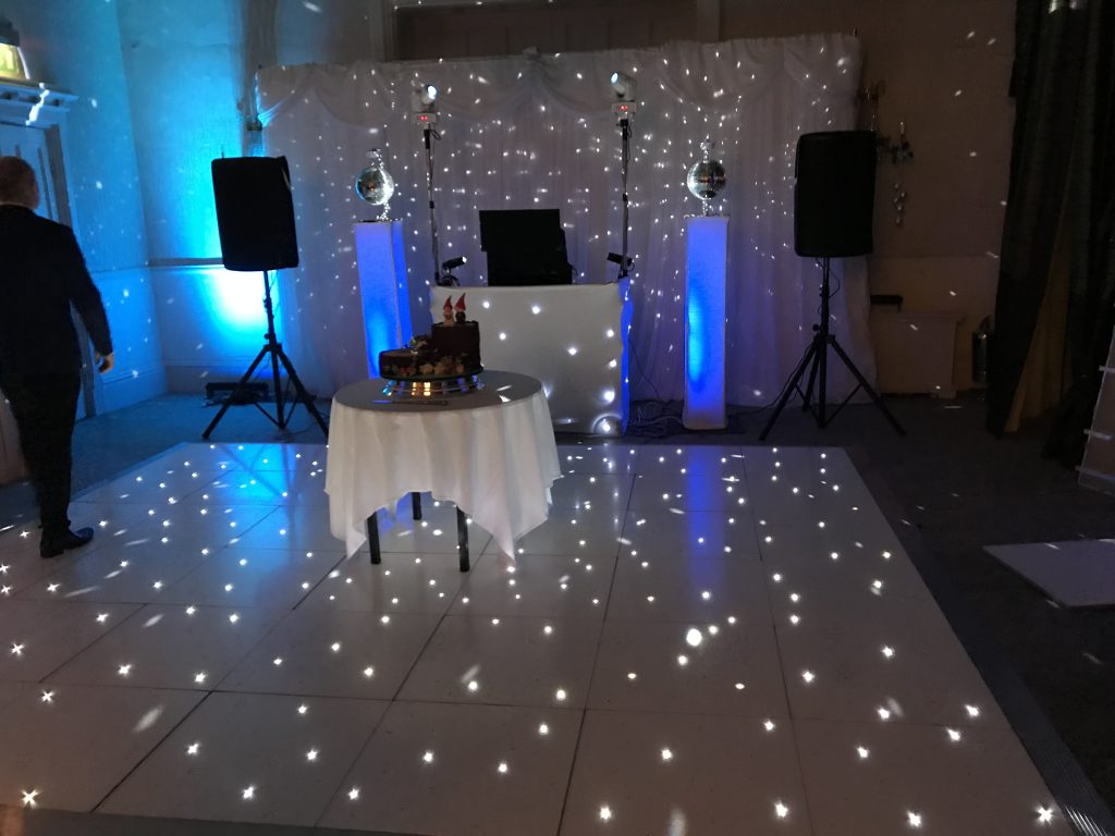 Small white starlit dance floor at Walton Hall Warwickshire