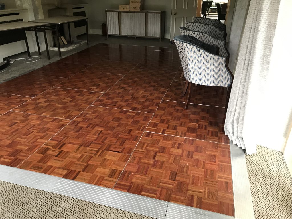 Parquet dance floor with chairs on top