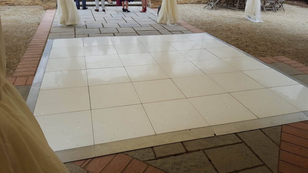 White dance floor on a slabbed floor
