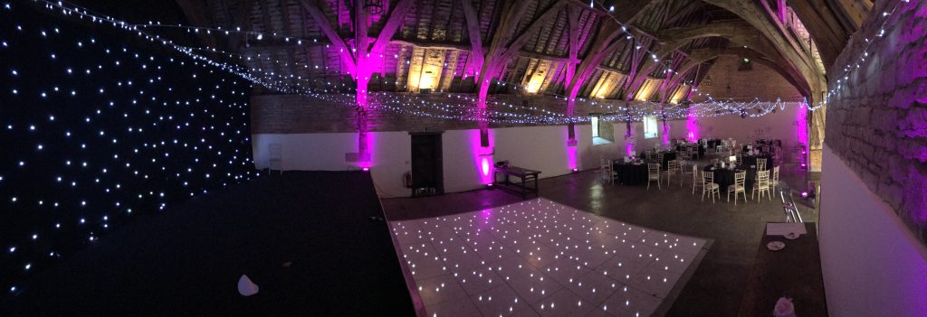 Fairy light ceiling with purple room lighting and white dance floor