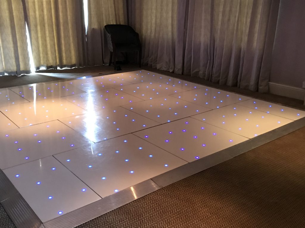 White starlit dance floor with blue LEDs