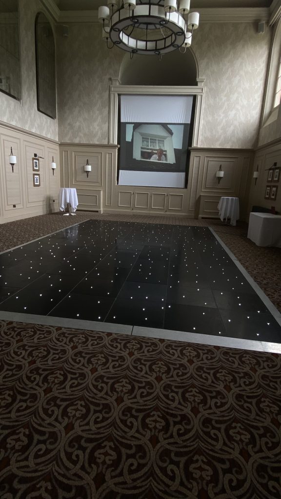 Black starlit dance floor in St Annes Hall at Stanbrook Abbey