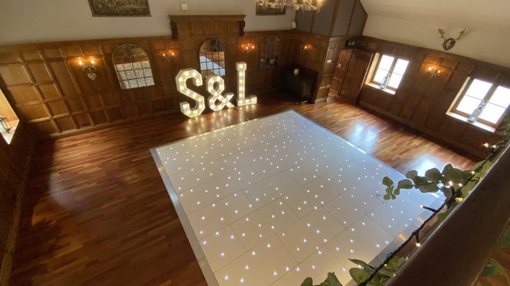 S & L light up letters with a white led starlit dance floor in front. 