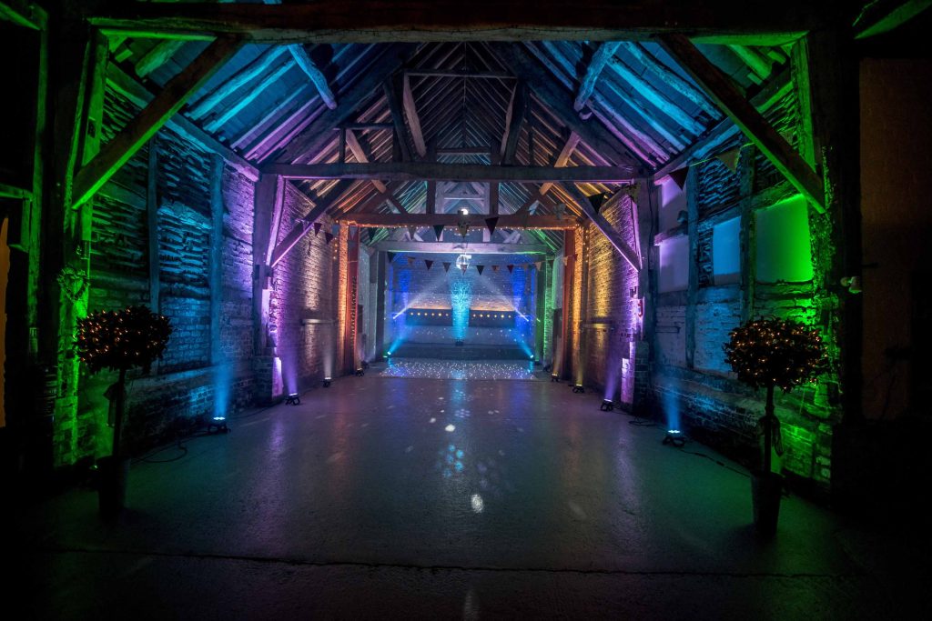 Starlit dance floor with colourful lighting around