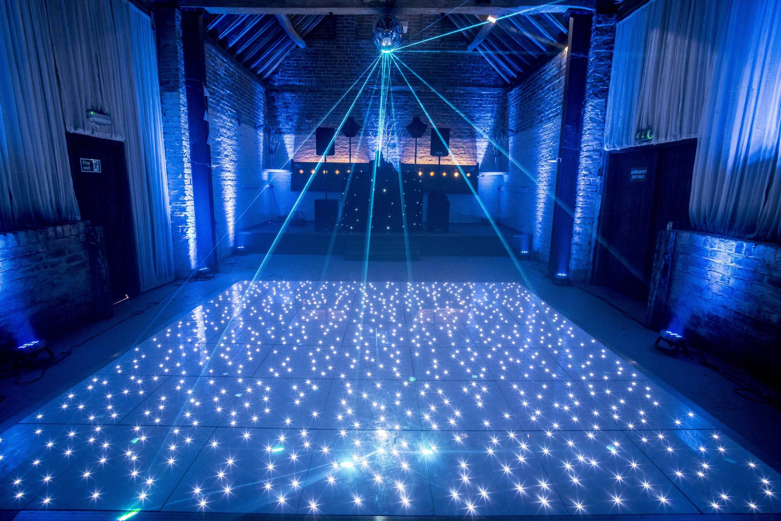 White starlit dance floor with mirror ball lasers too.
