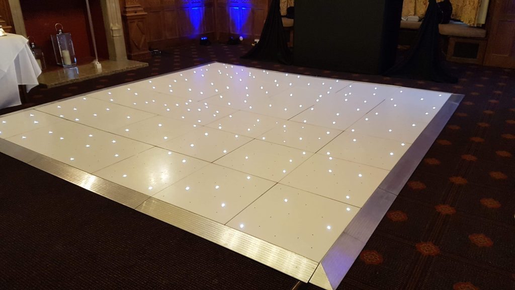 White led dance floor setup ready for a wedding party., 