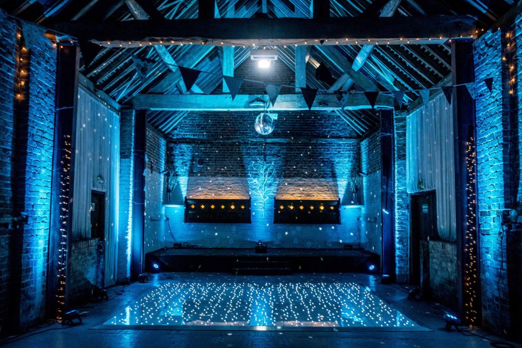 White led dance floor with light blue lighting around