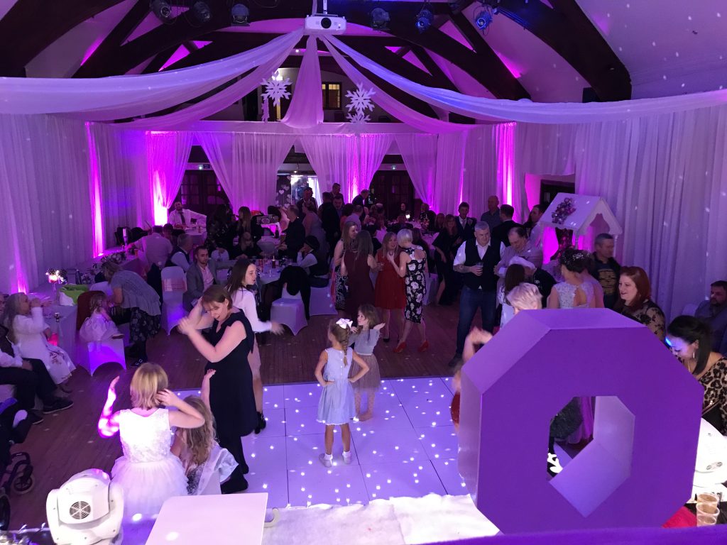 White starlit dance floor with pinky purple lighting at the Lifford Hall