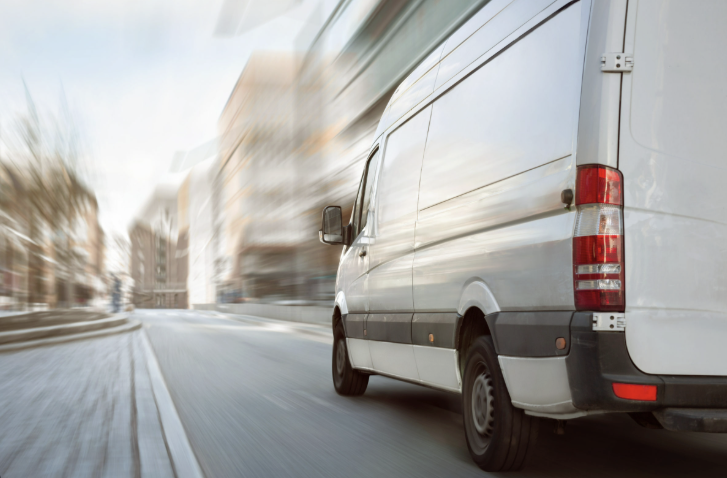 Van delivering dance floors