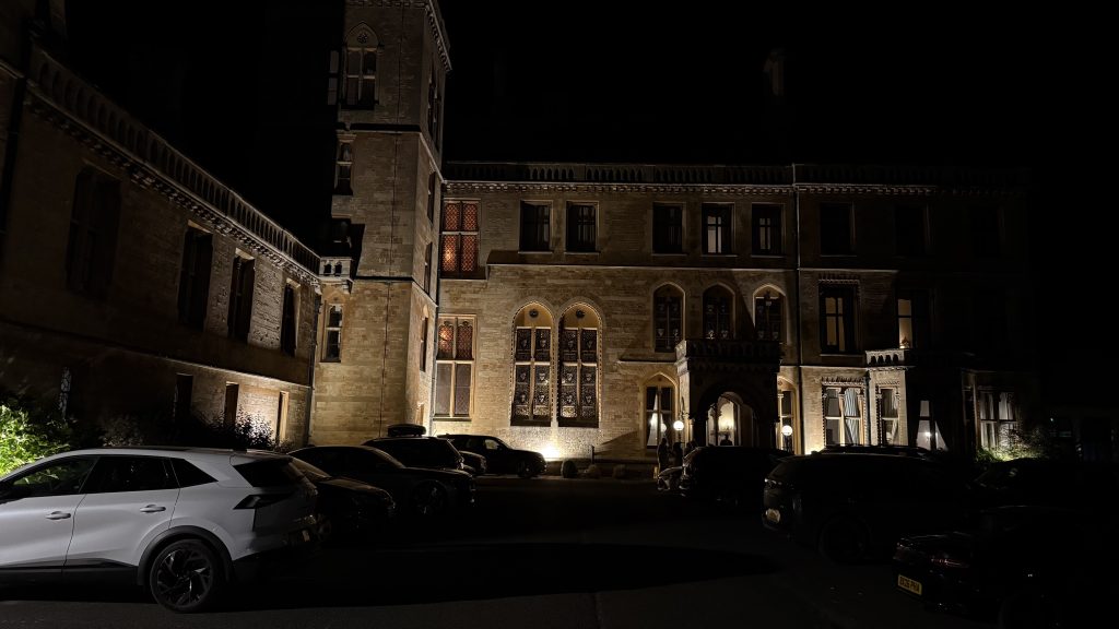 Front of Walton Hall Hotel at night time with lights on