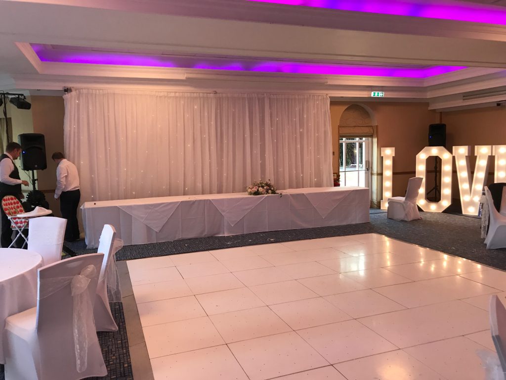 Pure white non led dance floor at a wedding reception