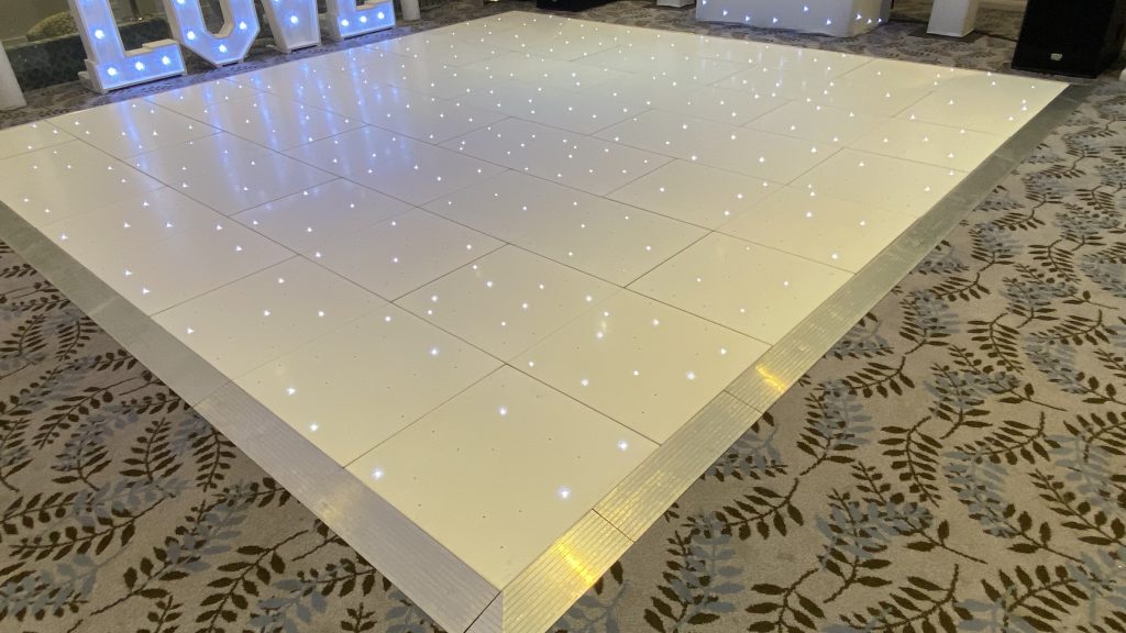 White sparkle led dance floor with silver edging