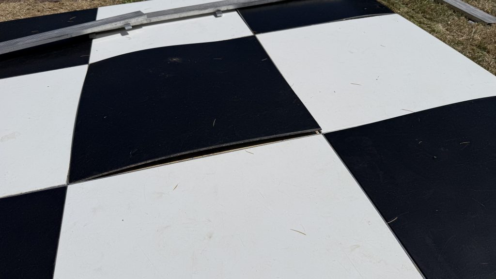 Damaged black and white dance floor