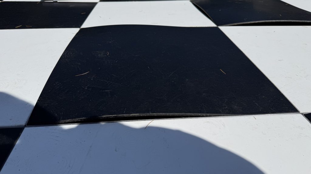 Damaged black and white dance floor