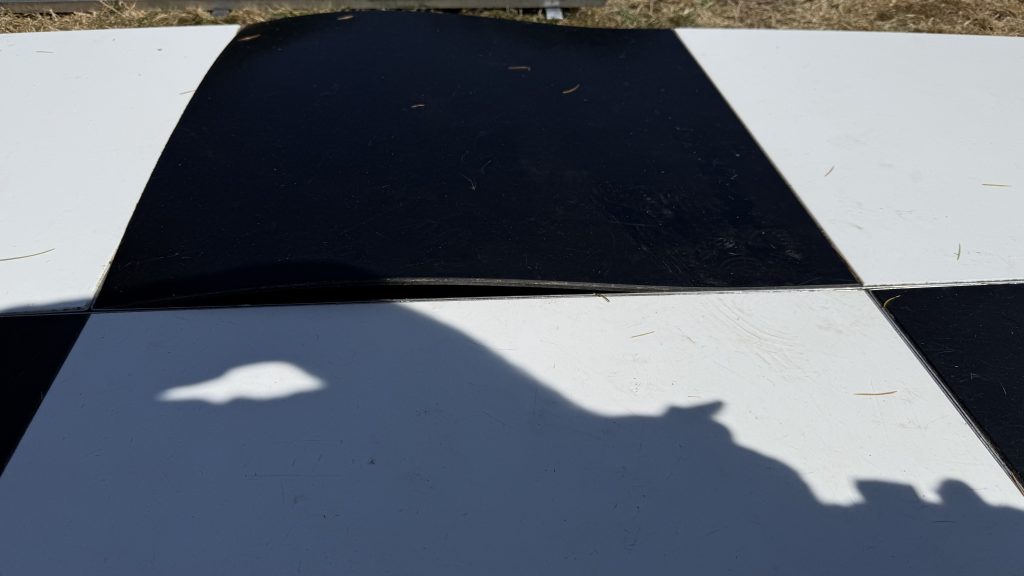 Damaged black and white dance floor