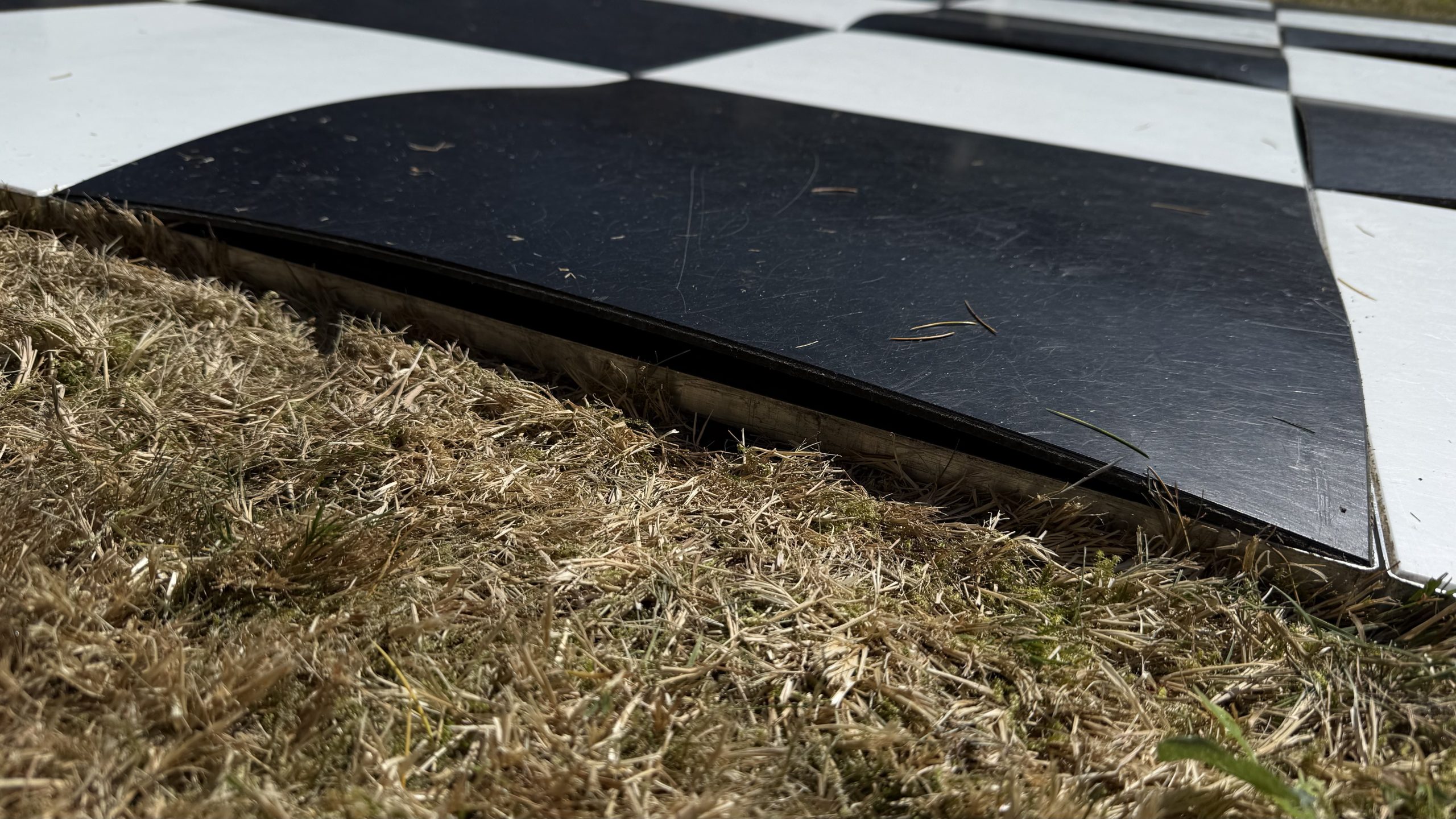 Damaged black and white dance floor