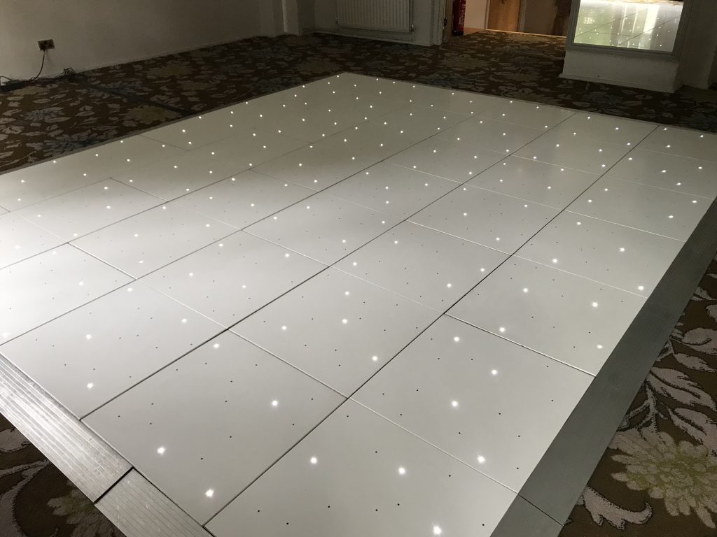 White starlit dance floor setup in the function room of the hotel