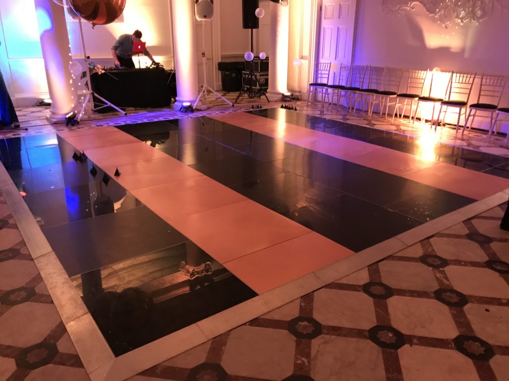 black and gold stripped dance floor