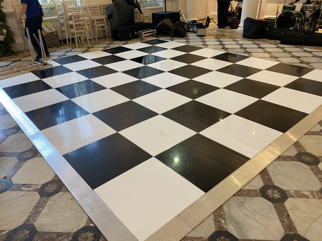 black and white dance floor with silver trim
