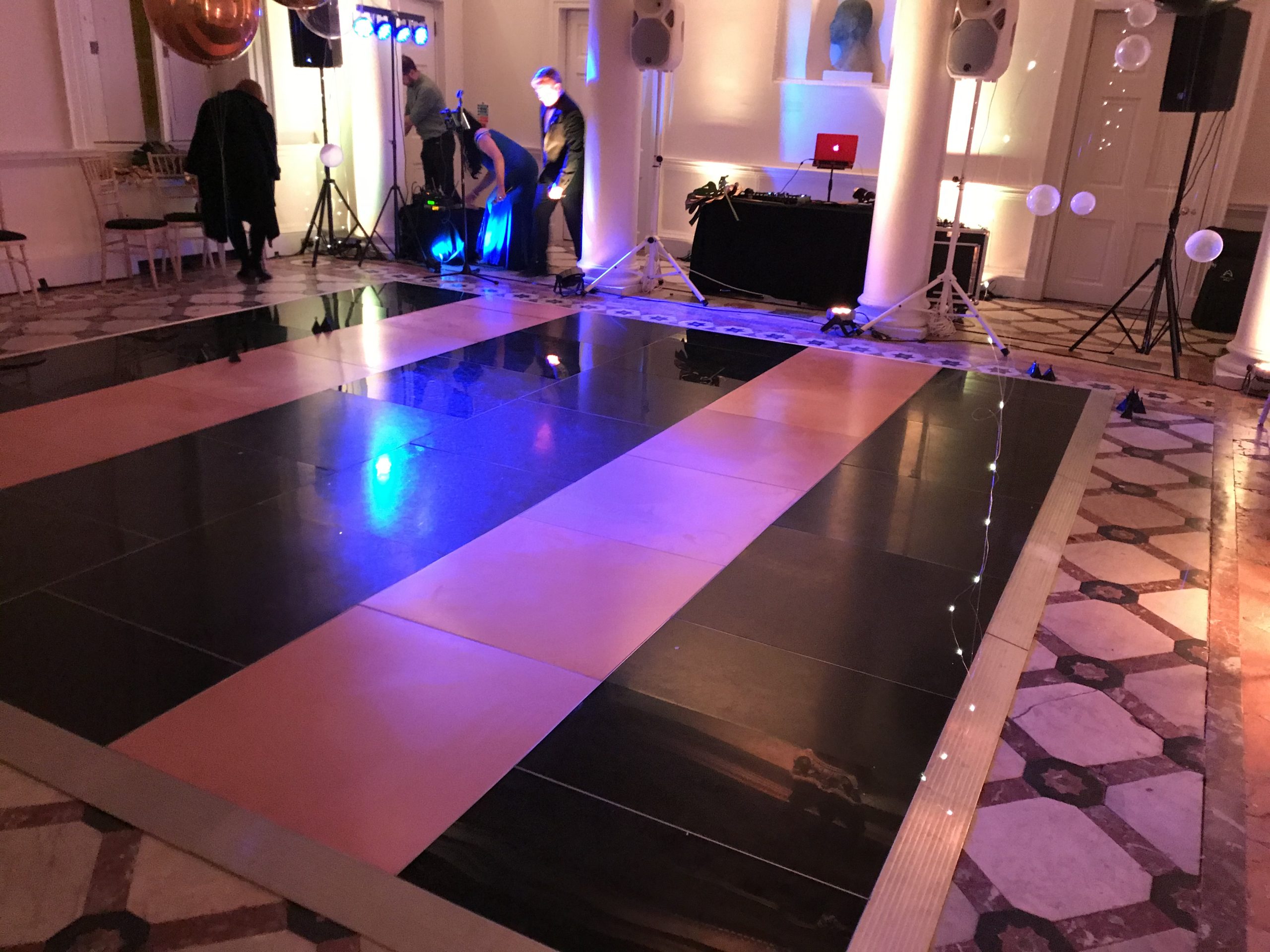 Black and gold stripped dance floor