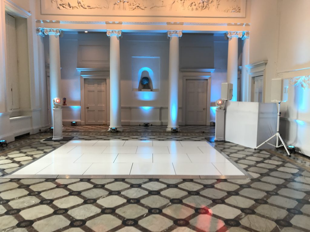 pure white non led dance floor in daytime with white disco setup