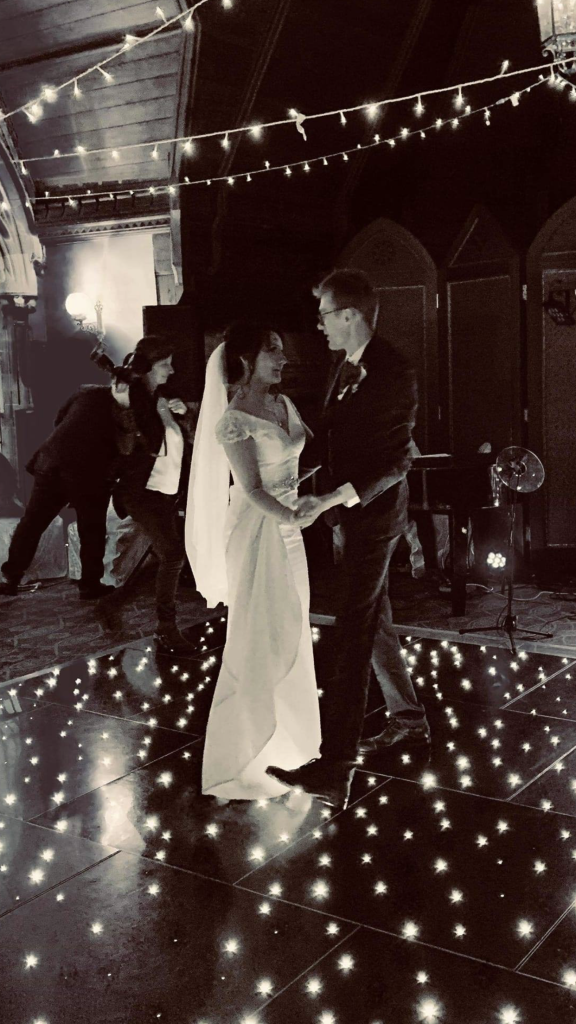 black starlit dance floor in the long gallery at ettington park