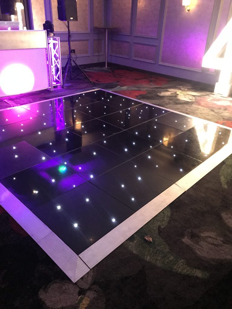 Black starlit dance floor at the hotel du vin